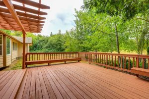 Exterior of house with empty wooden walkout deck. Wisconsin, USA